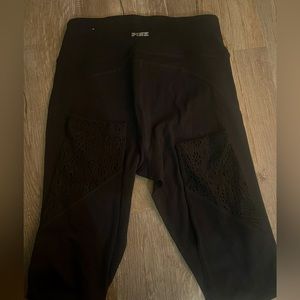 Pink leggings with little designs on the ankles